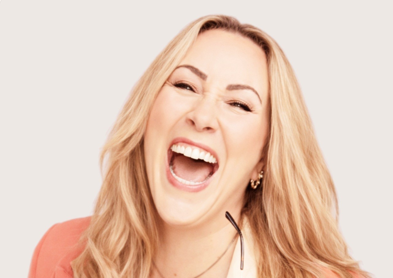 Nicola Vanlint smiling and laughing showing that therapy can be warm, approachable and enjoyable in Greenwich London